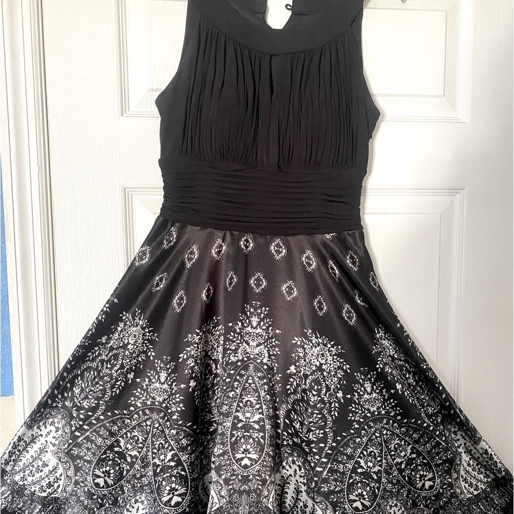 Size 8 Black Melrose Dress. Silk bottom, Only worn once. Great condition